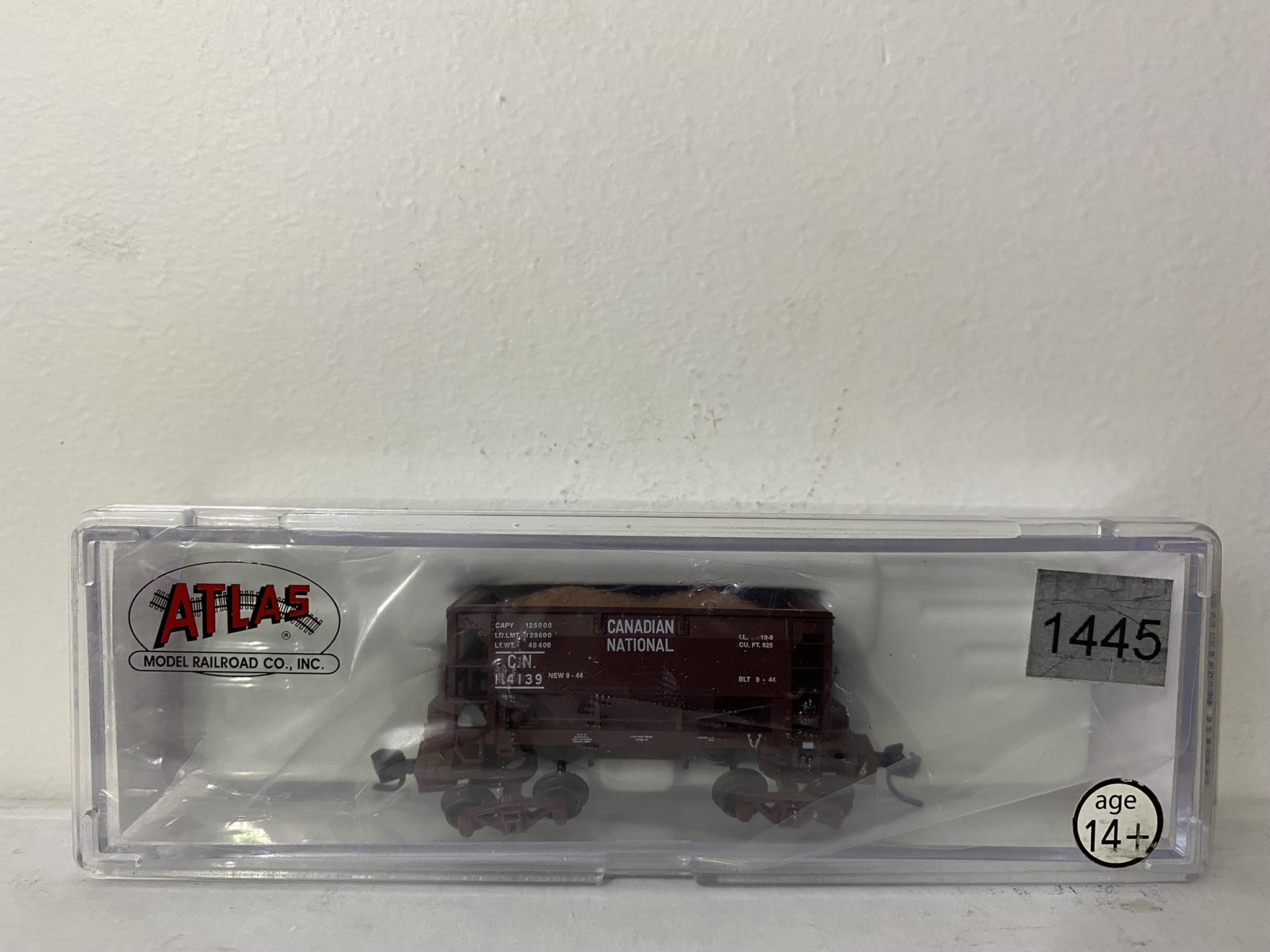 Atlas Trainman #409-502000 Series: 70 Ton Ore Car with AccuMate® couplers.